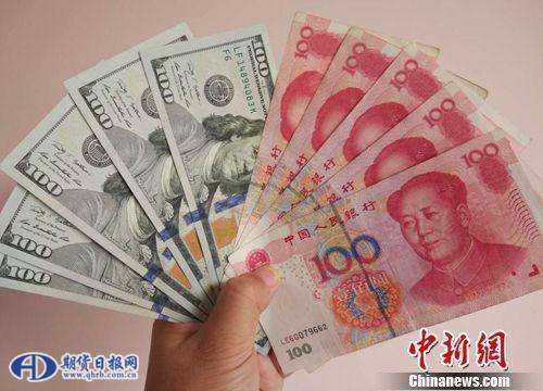 美元和人民币资料图。<a target='_blank' href='http://www.chinanews.com/' >中新网</a>记者 李金磊 摄